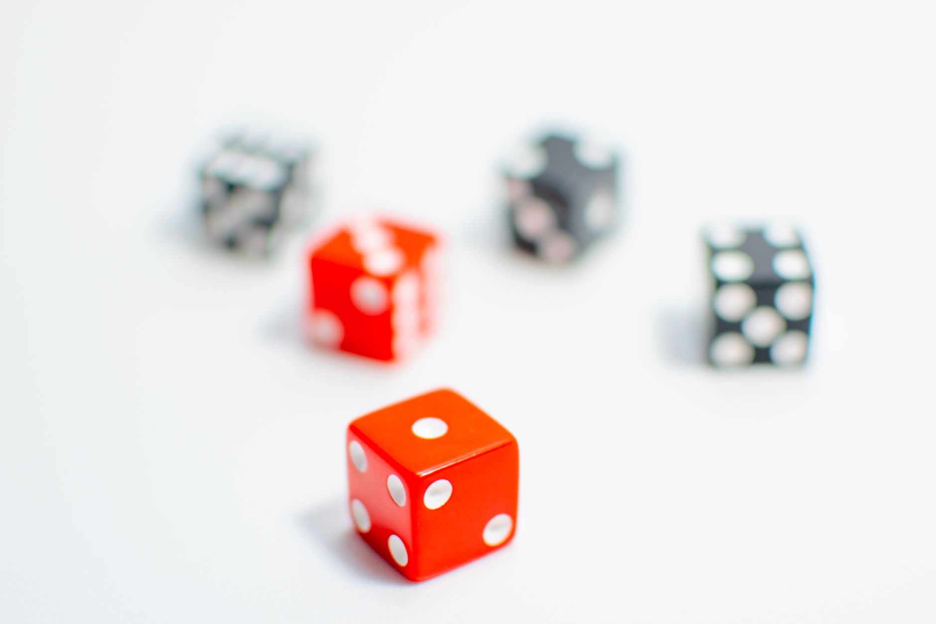 colorful dice in focus with blurred background